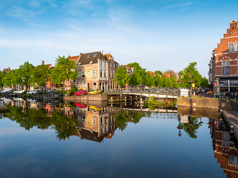 View of Leiden town, oude rijn, typical Dutch city skyline with canals and houses, Holland, Netherlands