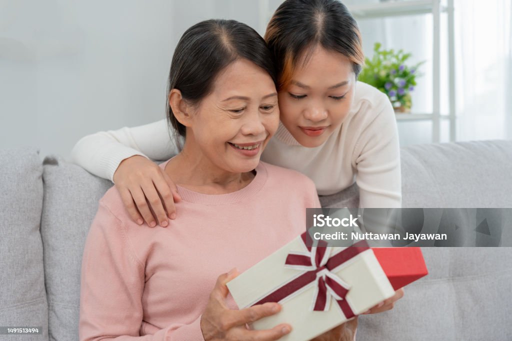 Mother Day Cute Asian Teen Girl Give Gift Box To Mature Middle Age Mum Love  Kiss Care Happy Smile Enjoy Family Time Celebrating Special Occasion Happy  Birthday Happy New Years Merry Christmas
