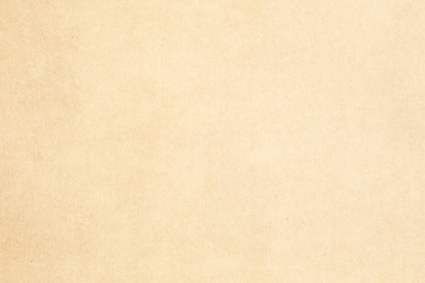 istock yellow kraft paper background with grainy texture 1491517135