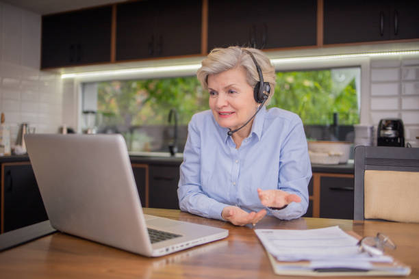 istock Mature woman working from home 1491517192