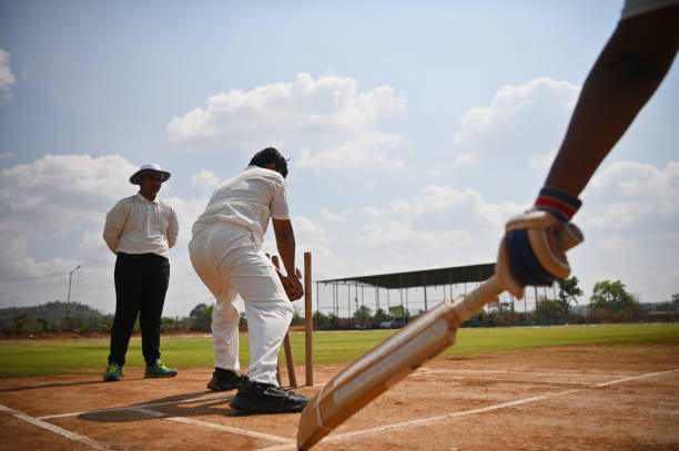 istock Fielder trying to run out a batsman during a thrilling cricket match. 1491518405