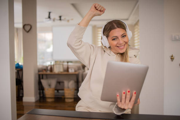 istock Woman enjoying music 1491519731