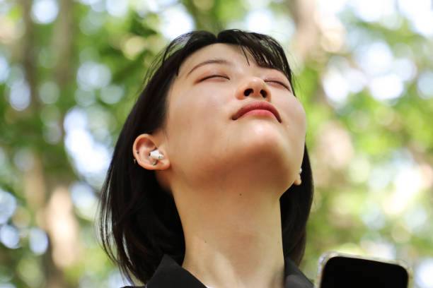 istock Woman listening music 1491521406