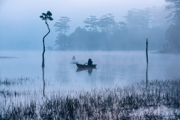 istock Fisherman in Tuyen Lam lake 1491523239