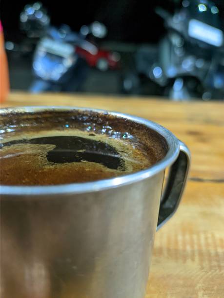 cup of black coffee on stainless cup