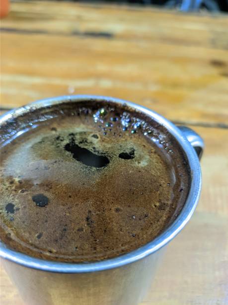 istock cup of black coffee on stainless cup 1491524836
