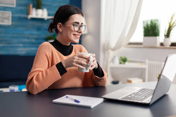 istock Student college looking at laptop computer screen searching for marketing information 1491525013