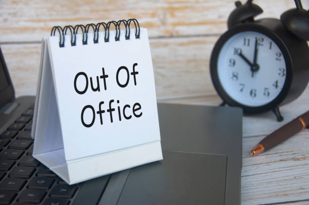 istock Out of office notification text on white notepad. Out of Office concept 1491527214