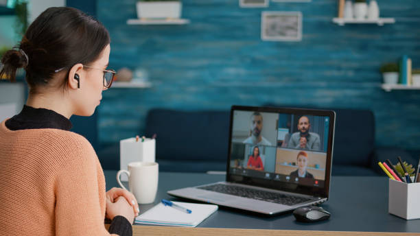 istock University student attending video call meeting with people 1491527529
