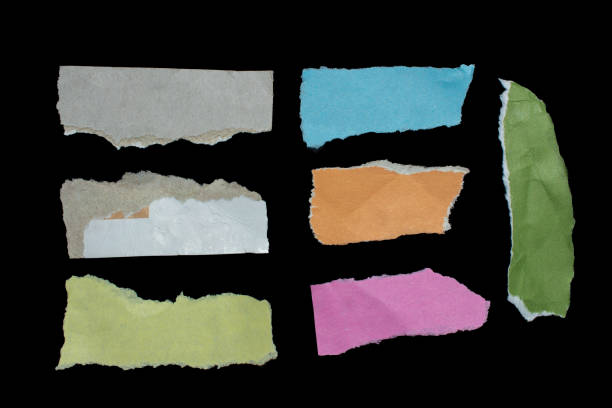 istock Set of torn paper pieces isolated on black background 1491528953