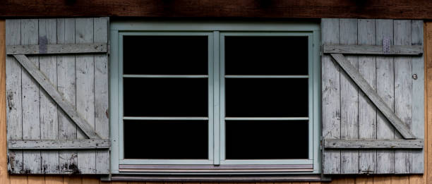 istock Old vintage wooden window shutters 1491529265
