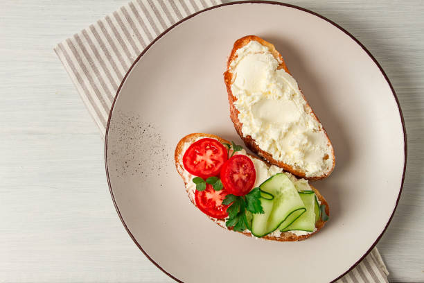 istock Sandwich, with cream cheese, homemade, on a cutting board, rustic style, no people, selective focus, breakfast 1491532456
