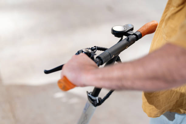 istock Unrecognizable man commuting through city with electric push scooter 1491532577