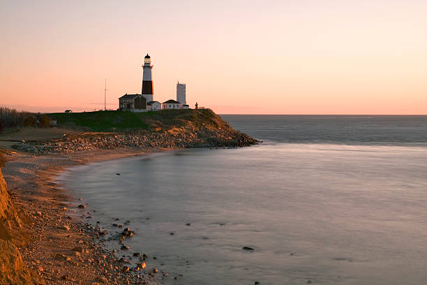 Montauk Point Lighthouse Montauk lighthouse early in morning as the sun rises. montauk point stock pictures, royalty-free photos & images