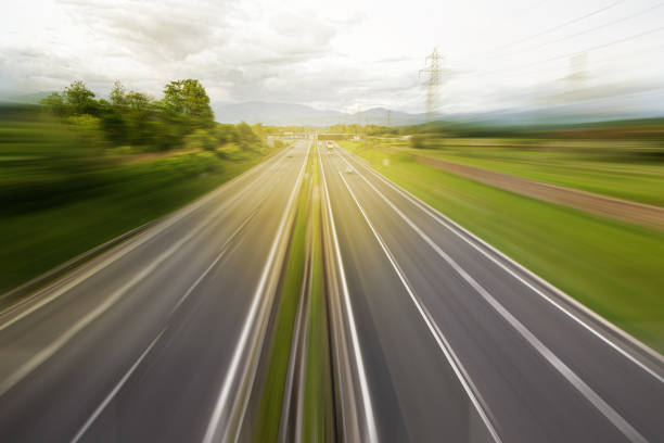 vanishing point perspective of motion blur highway lanes