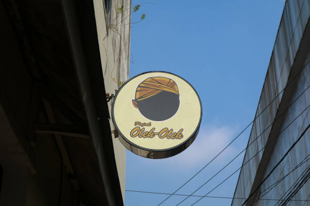 Yogyakarta, Indonesia - March 20, 2023: Sign of souvenir center or pusat oleh-oleh on Malioboro roadside