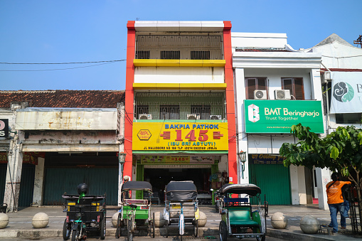 Yogyakarta, Indonesia - March 20, 2023: Bakpia Pathok store around Malioboro tourist area. Bakpia pathok is one of the famous shop that sell javanese food