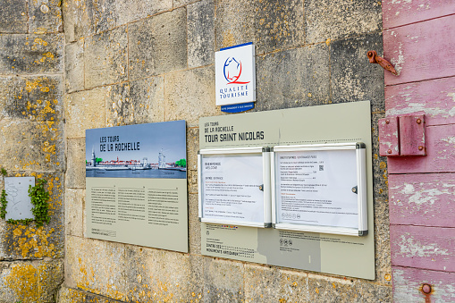 Street entrance of the Tour Saint-Nicolas tower in La Rochelle, France