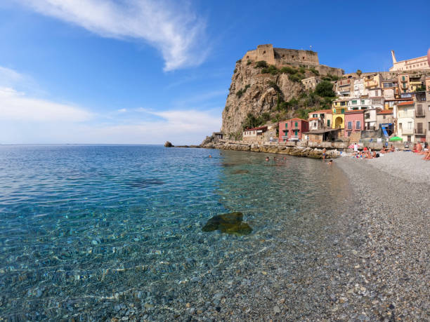 The sea and the color in a mediterranean beach under a castle (Scilla south Italy Calabria) Scilla Calabria Italy on September 8, 2021 The sea and the color in a mediterranean beach under a castle (Scilla south Italy Calabria) castle scilla stock pictures, royalty-free photos & images