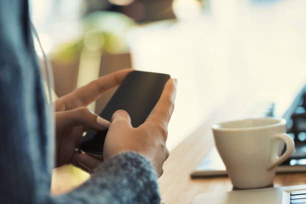 istock Woman uses smartphone, laptop among coffee essentials 1491544466
