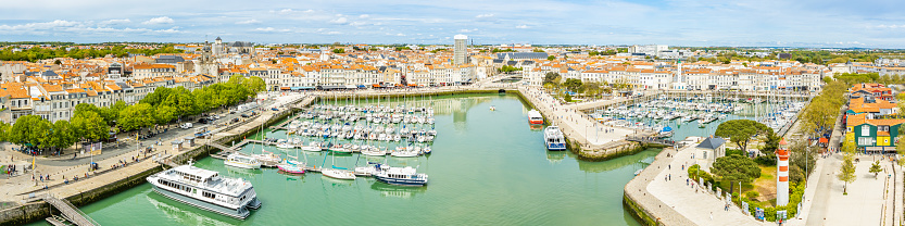 Old Port of La Rochelle seen from the top of the Saint-Nicolas tower on a sunny day in France