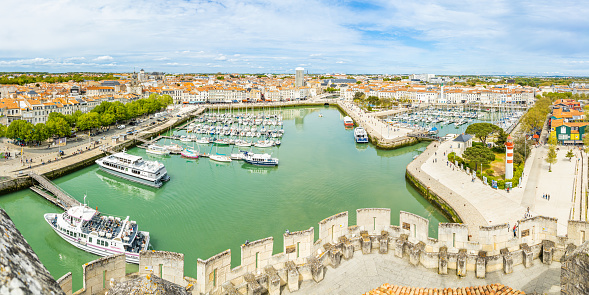 Old Port of La Rochelle seen from the top of the Saint-Nicolas tower on a sunny day in France