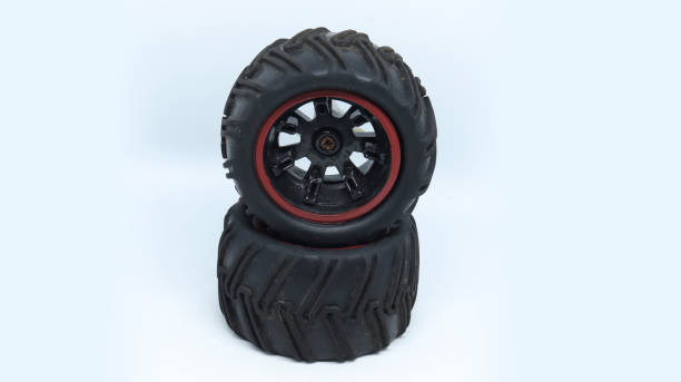 istock two black toy tire with white background 1491548183