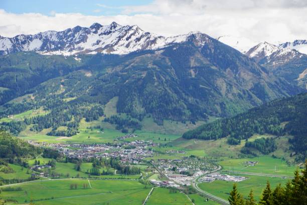 istock A walk through the spring Alps. The Alps in spring. The sky with clouds and green mountains. A walk through the mountains in spring. Green Austrian Alps in spring. 1491555497