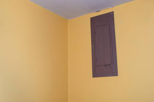 istock Old brown fuse box in yellow room 1491556248