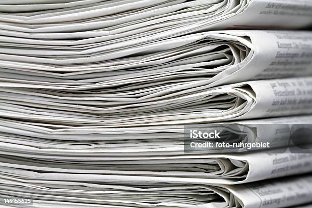A Stack Of Six Or Seven Newspapers Stock Photo - Download Image Now - Bright, Bundle, Business