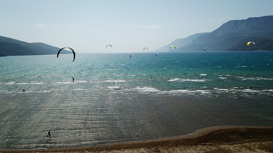 rough sea and kitesurfing drone view