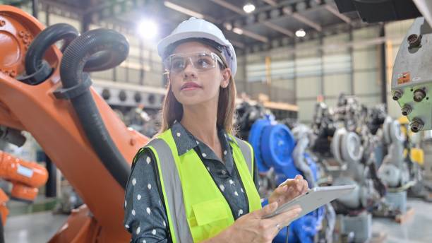 istock Business owner engineer managing and checking work at factory 1491571593
