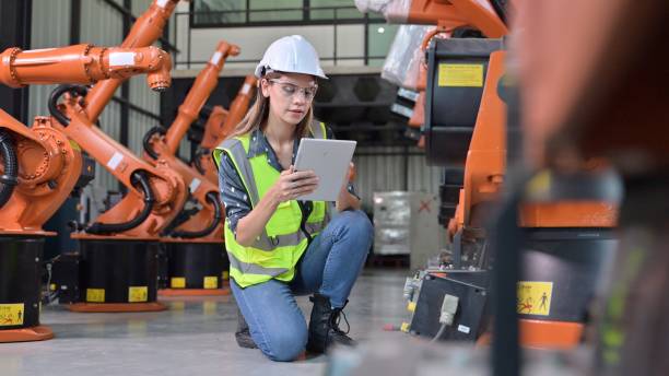 istock Business owner engineer managing and checking work at factory 1491571661