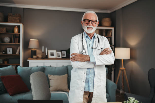 istock Senior doctor working in office 1491573901