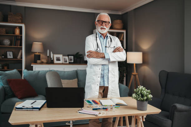 istock Senior doctor working in office 1491573912