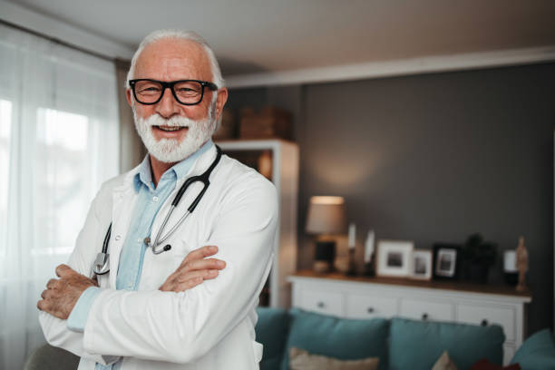 istock Senior doctor working in office 1491573935
