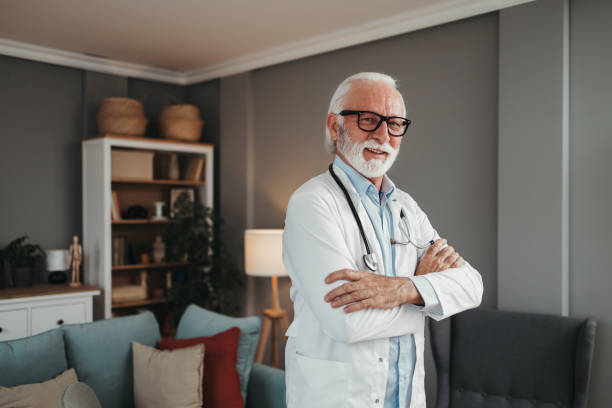 istock Senior doctor working in office 1491573937