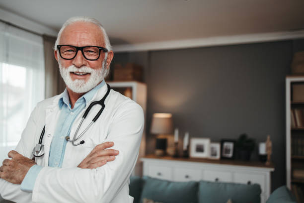 istock Senior doctor working in office 1491574012