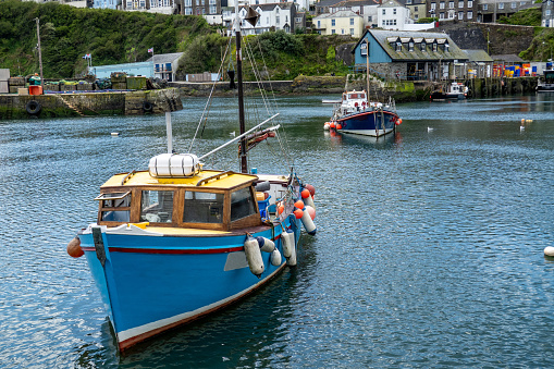 Mevagissey harbour in Cornwall is a thriving fishing port and major tourism destination throughout the year.