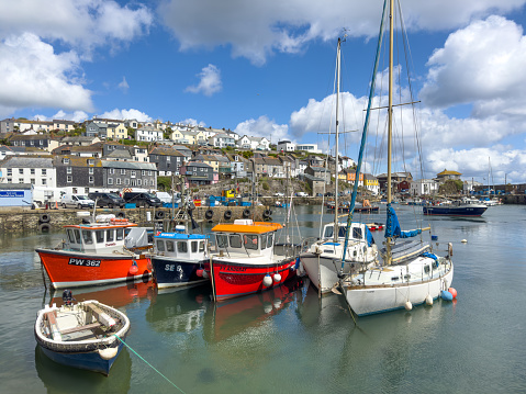 Mevagissey, United Kingdom - May 11th, 2023 :  Mevagissey harbour in Cornwall is a thriving fishing port and major tourism destination throughout the year.