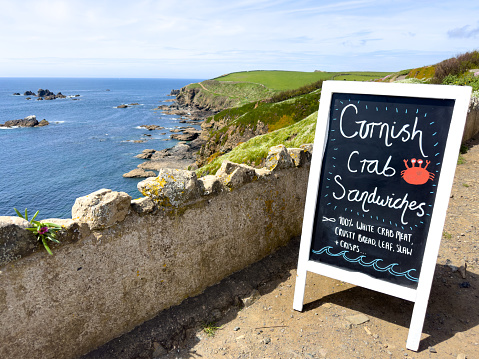 Cornish crab sandwiches sign at the Lizard in Cornwall, UK