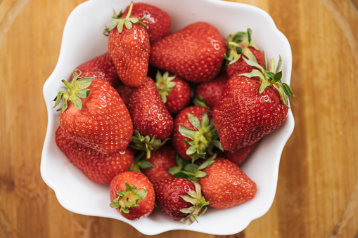 Strawberries decorated for background photography. Beautiful strawberries that are summer delights. Red strawberries with a special shade that evokes summer experiences. Ready to eat and enjoy.