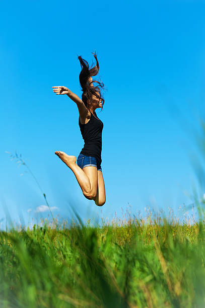 istock woman jumps up 149158241
