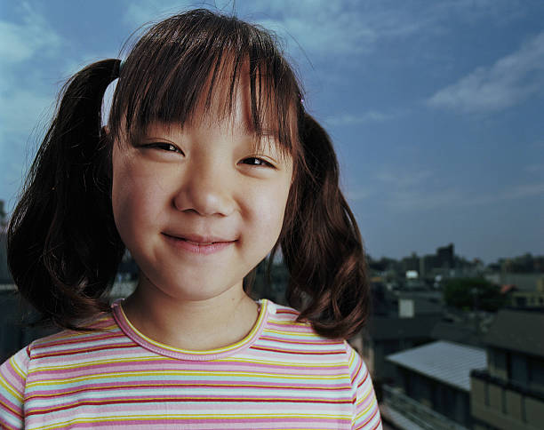 istock Girl (6-8) smiling, portrait 149158294