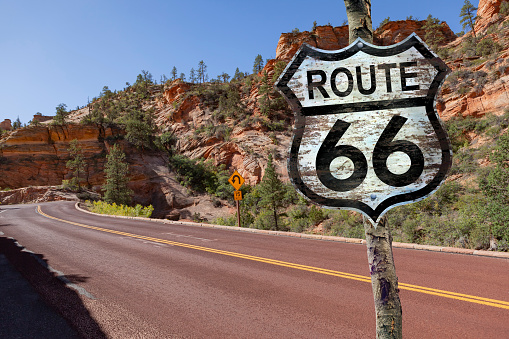 Empty Route 66 with road sign in Arizona USA at summer