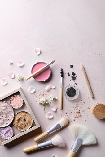 A closeup shot of face powder for makeup, bronzer, blusher, and highlighter