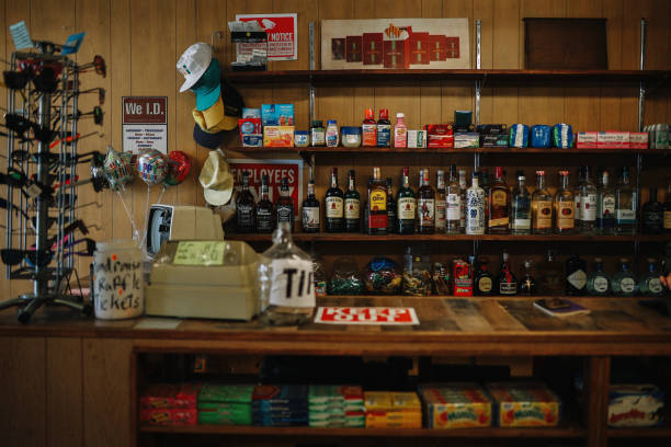 American small convenience store counter Counter in a small local business American convenience store (bodega). liquor store counter photos stock pictures, royalty-free photos & images