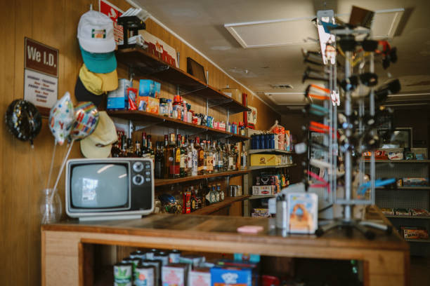 American small convenience store counter Counter in a small local business American convenience store (bodega). liquor store counter photos stock pictures, royalty-free photos & images