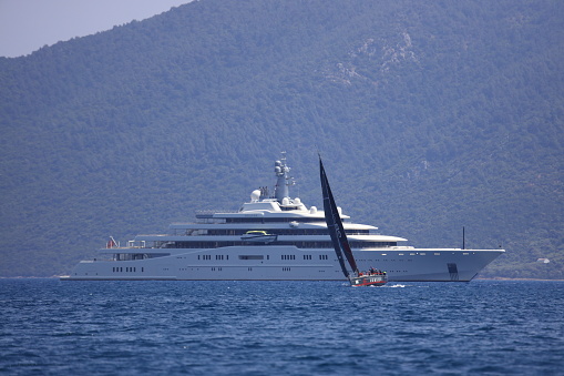 Bodrum, Turkey-  May 07, 2023: The giant superyacht Solaris, owned by Russian businessman Roman Abramovich, anchored in Bodrum's