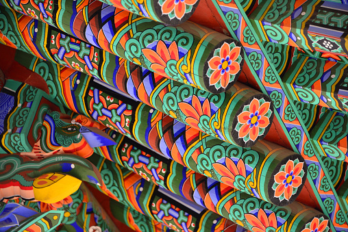 Ganghwa Island, Incheon, South Korea: Dancheong Korean traditional decorative colouring on wooden buildings - Jeondeungsa Buddhist Temple - Samnangseong castle.